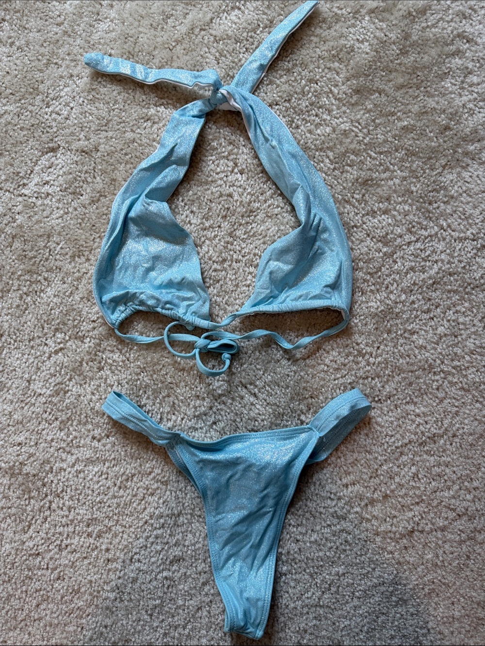 Frankie’s Bikinis Sparkling light blue halter bikini top with low rise bottoms